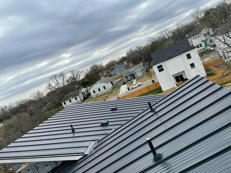 Standing seam metal roof panels with vents for Skylight Repair in Utica